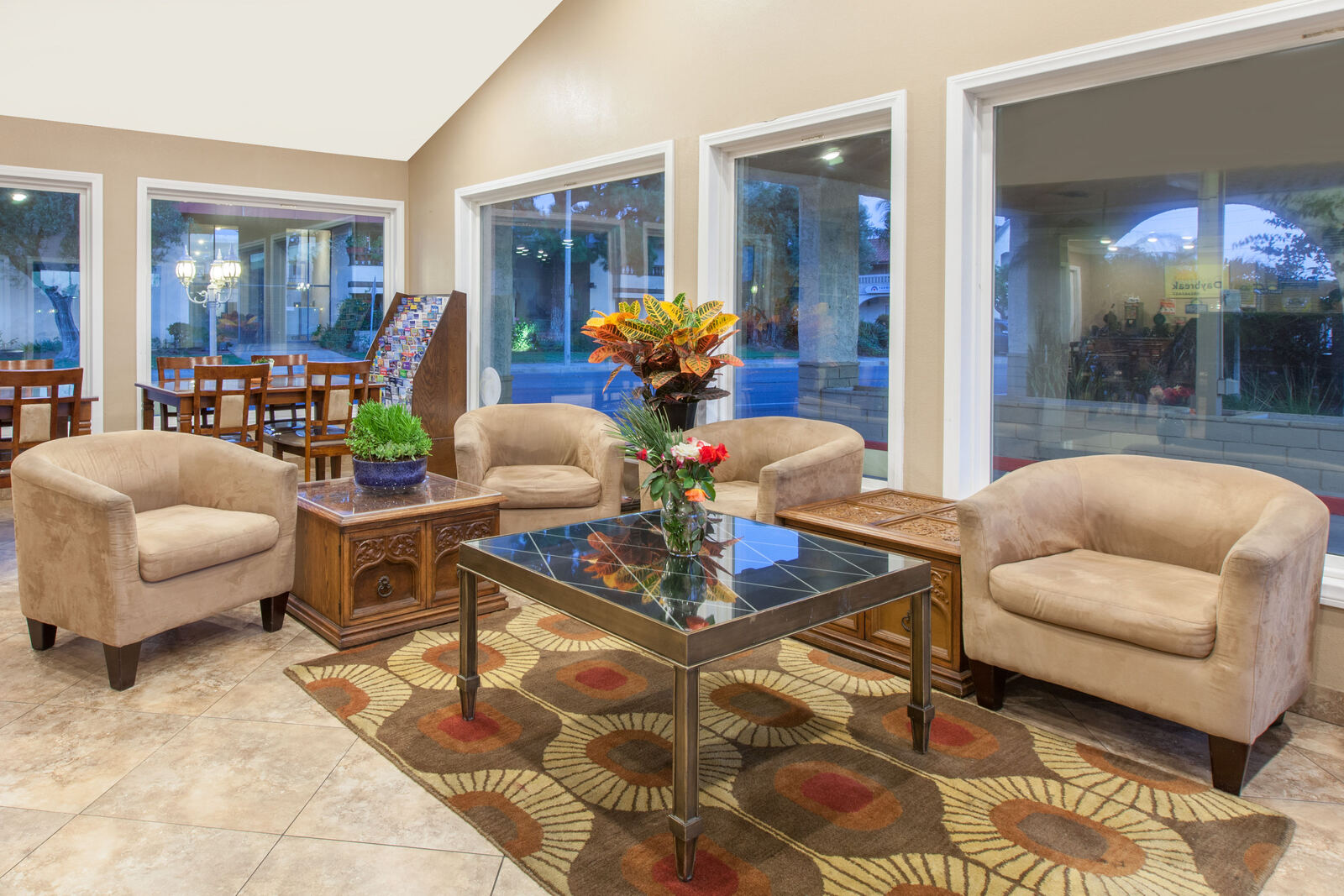 Lobby with armchairs and large windows